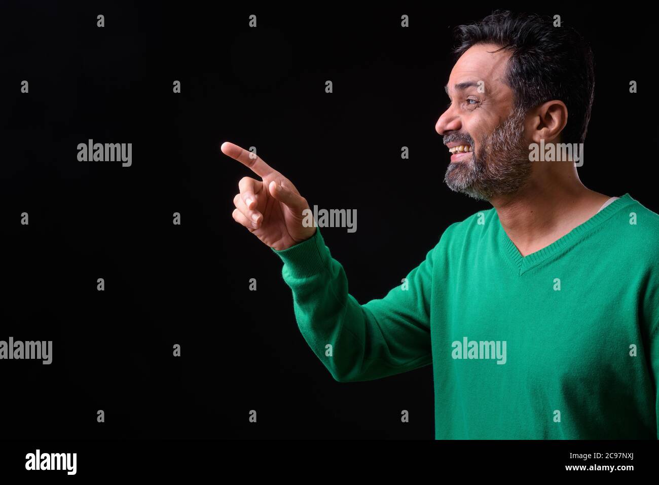 Portrait of mature bearded Indian man with curly hair Stock Photo - Alamy