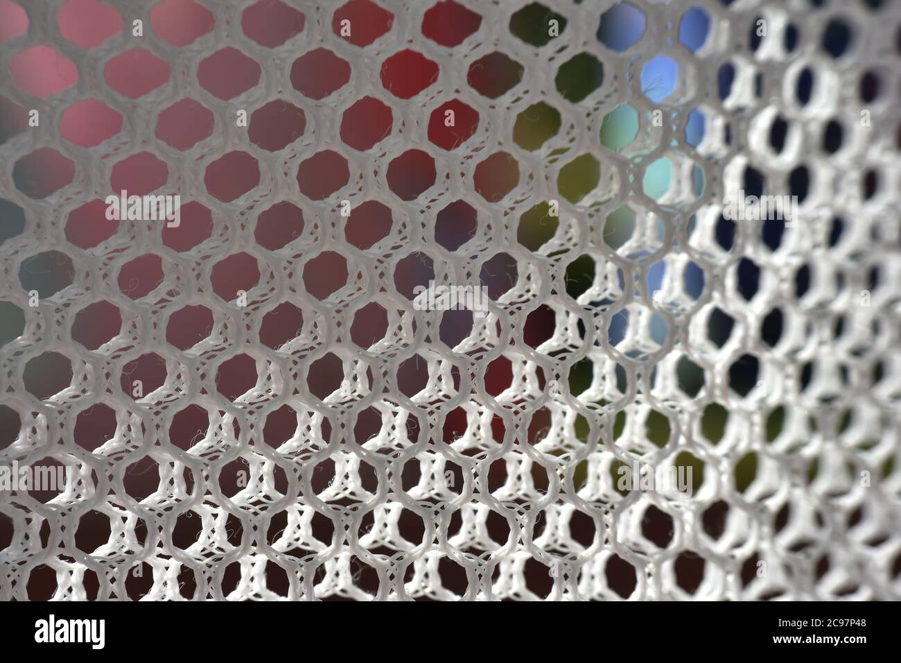 A simple white texture pattern of hexagons as a background Stock Photo