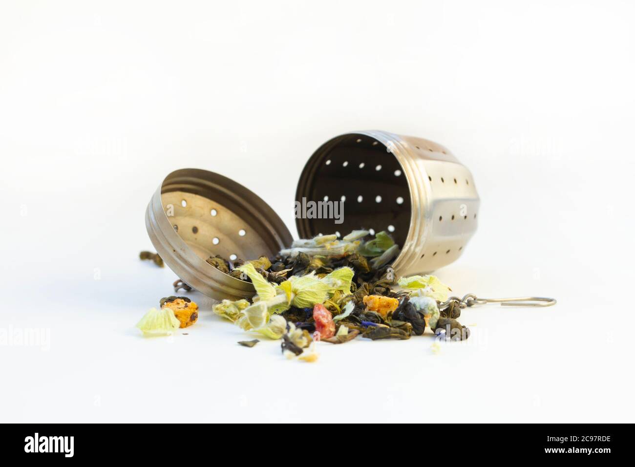 loose herbal tea in tea strainer Stock Photo