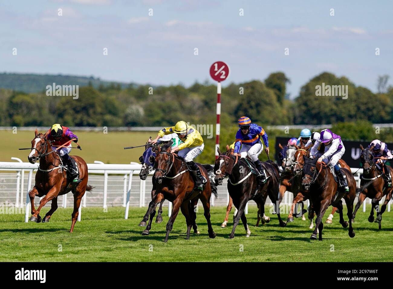 Just Hubert ridden by Tom Marquand (yellow) wins The Unibet You're On Goodwood Handicap during day two of the Goodwood Festival at Goodwood Racecourse, Chichester. Stock Photo