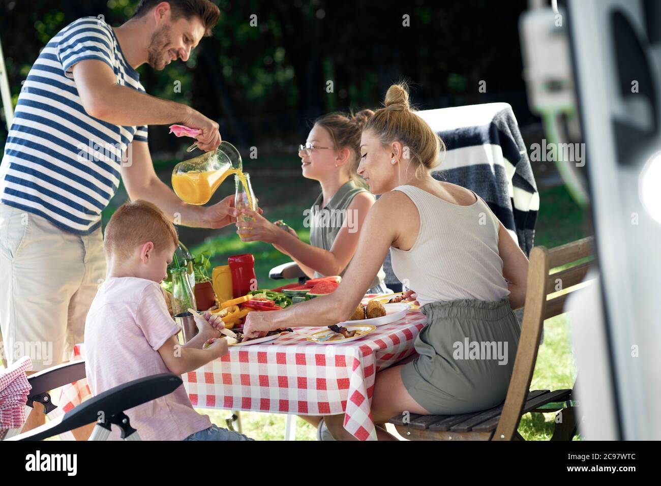 Cheerful family on the camping Stock Photo