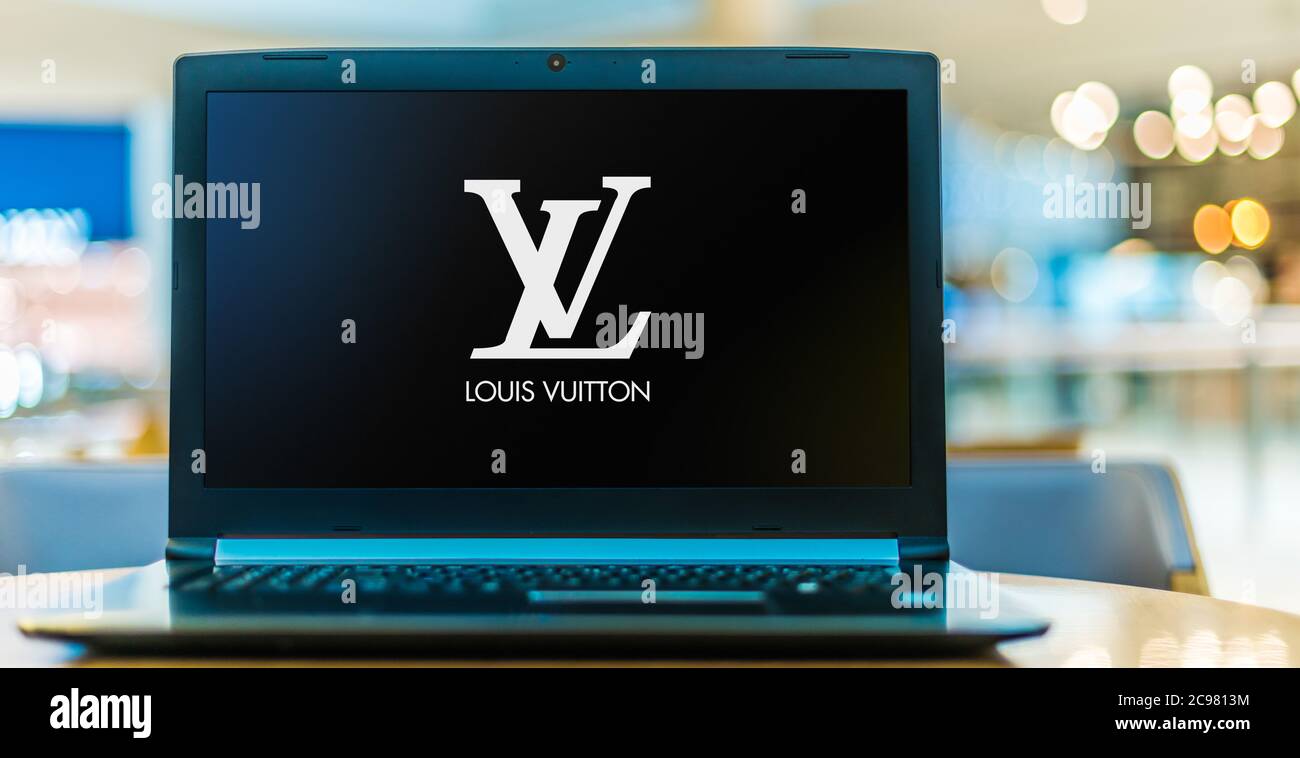 POZNAN, POL - JUN 20, 2020: Laptop computer displaying logo of Louis Vuitton, a French fashion house and luxury retail company founded in 1854 by Loui Stock Photo