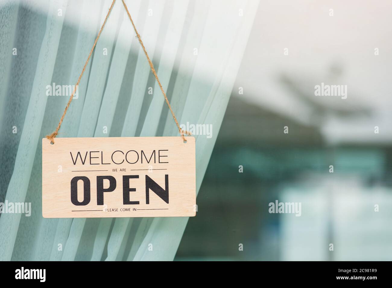 Close Up Of Welcome We Are Open Please Come In Notice Sign Wood Board Label Hanging Through Glass Door Front Shop Business Open Back To New Normal Af Stock Photo Alamy