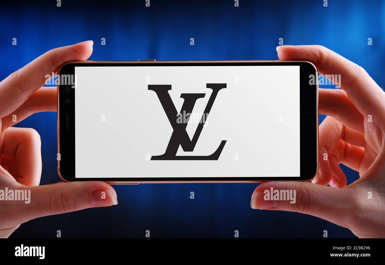 foredrag træner Antibiotika POZNAN, POL - JUN 12, 2020: Hand holding smartphone displaying logo of Louis  Vuitton, a French fashion house and luxury retail company founded in 1854  Stock Photo - Alamy