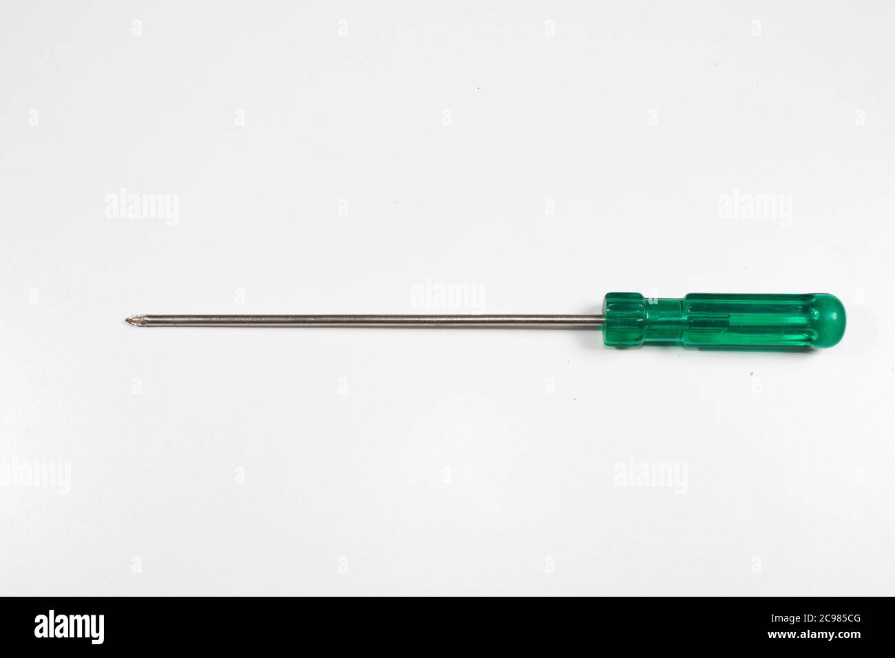 A typical Phillips screwdriver has a colored handle and on white background, clipping path Stock