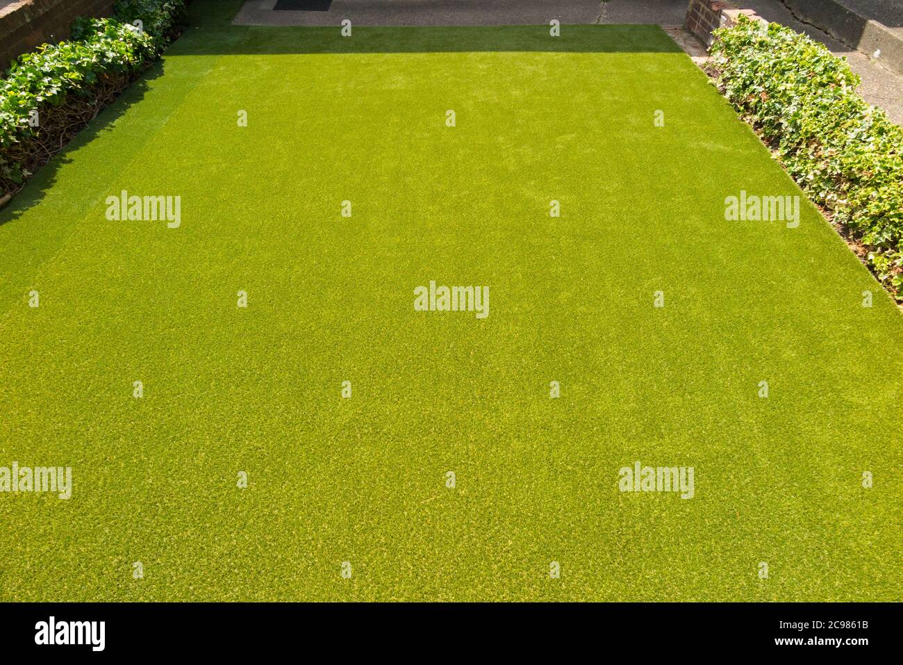 Artificial grass / newly laid astroturf perfect lawn in the front