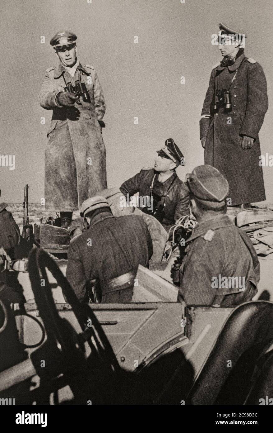 General Erwin Rommel briefing his staff during the First Battle of El Alamein (1–27 July 1942) in the Western Desert Campaign of the Second World War, fought in Egypt between Axis forces  and Allied forces of the Eighth Army. Stock Photo