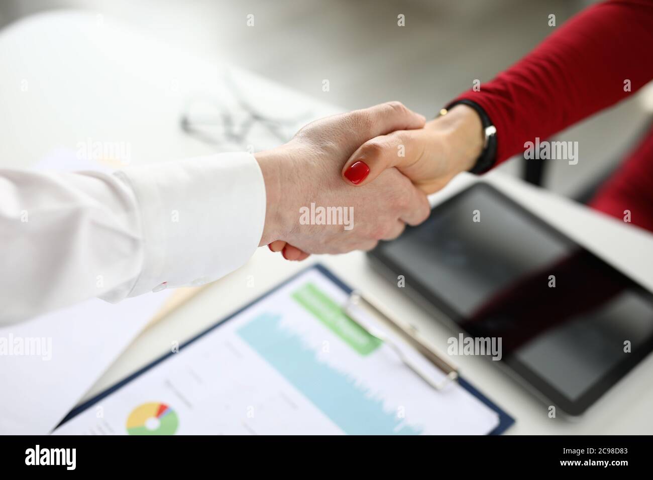 Leader concludes an agreement with a male partner Stock Photo