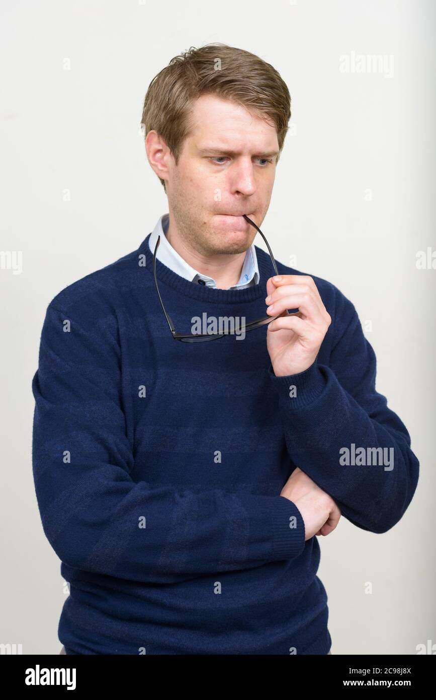 Portrait of young handsome man with blond hair Stock Photo - Alamy
