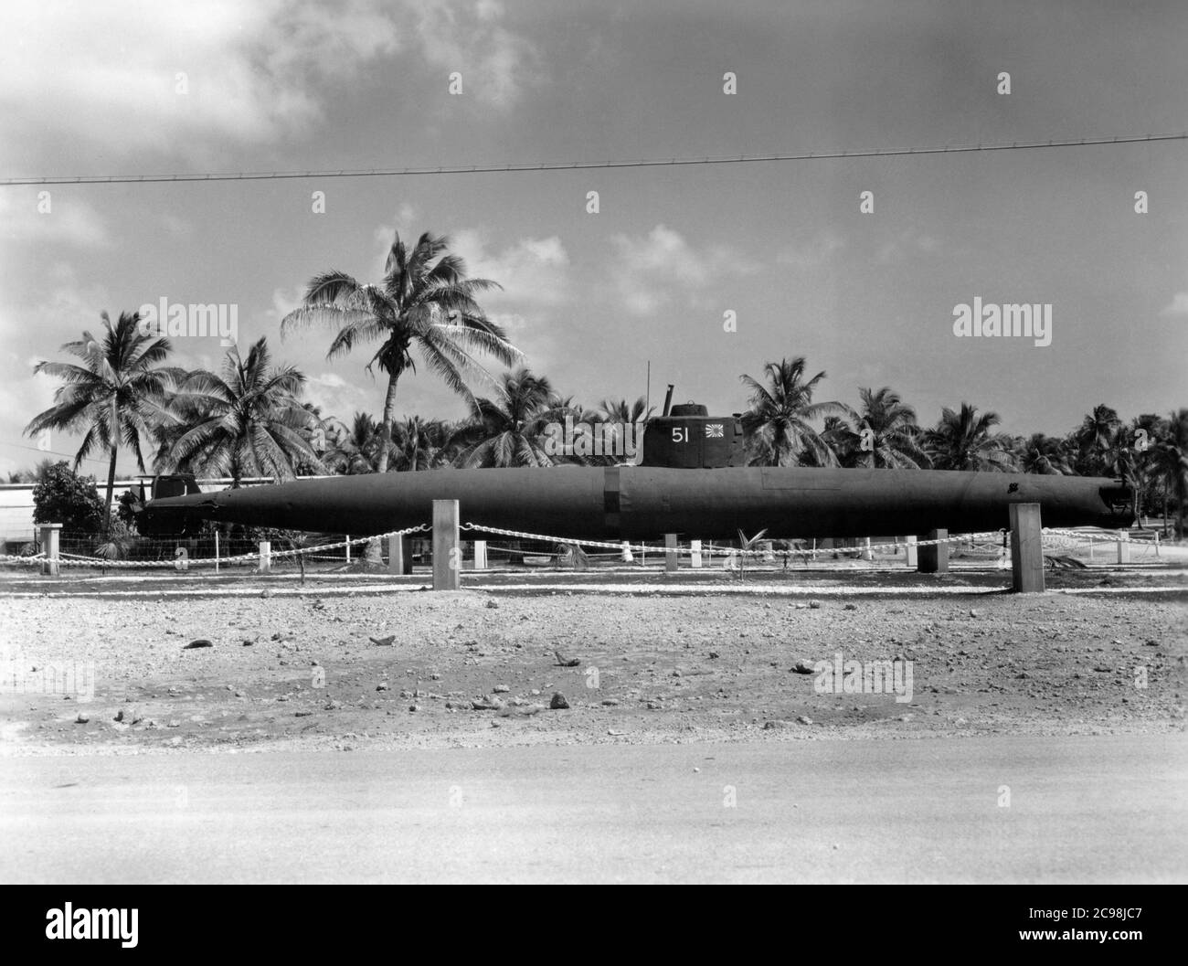 Japanese mini submarine number HA-51 at Camp Dealey Submarine Recuperation Camp. Guam, July 1945. As the 75th anniversary of V-J Day approaches, The Consoli Collection has published four photo essays by U.S. Navy Lt. (j.g.) Joseph J. Consoli. The photos were taken between July and December 1945 in the Mariana Islands. They document U.S. Navy life before and after the Japanese surrender. Stock Photo