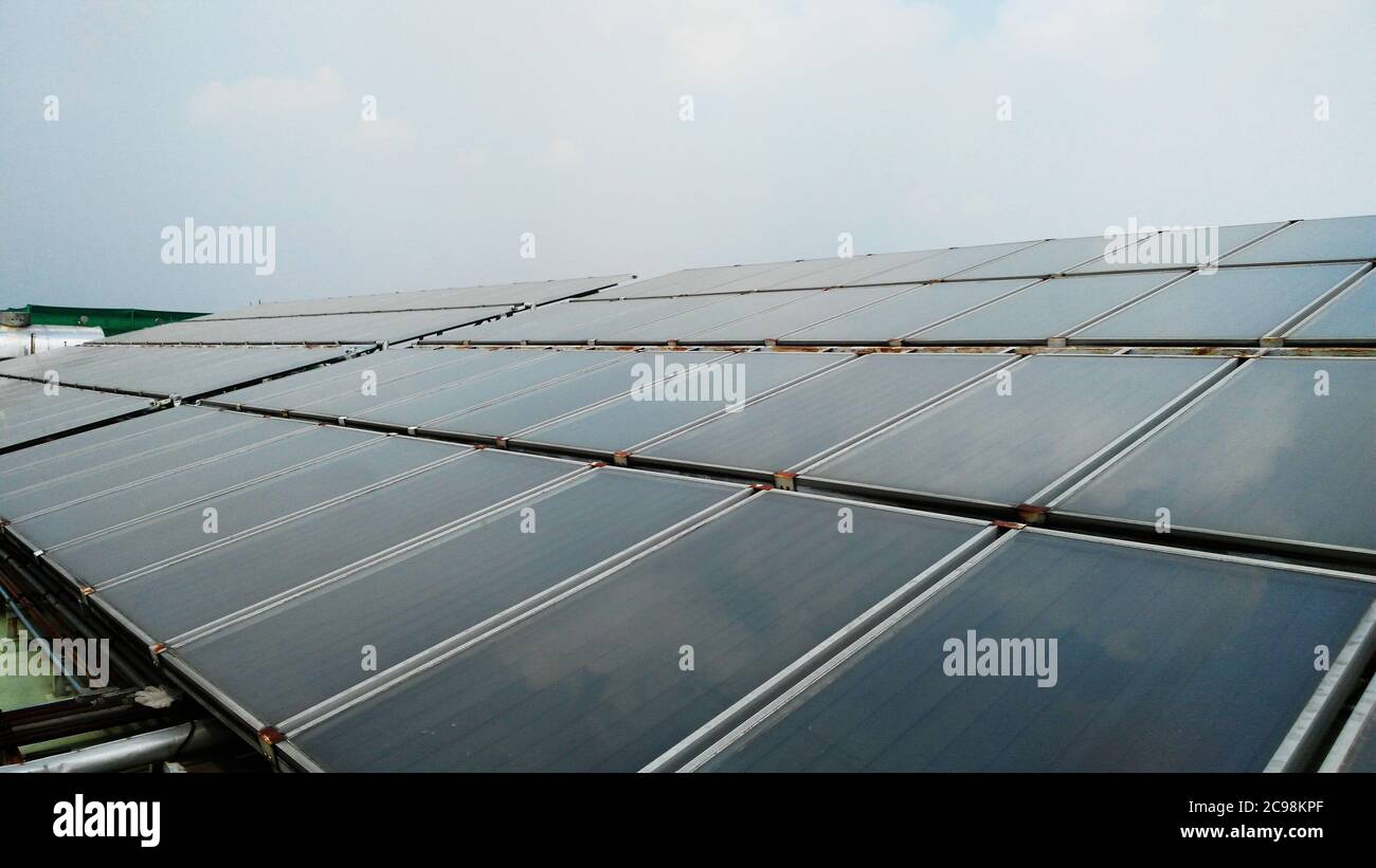 Flat plate solar thermal collectors in Hospital Stock Photo