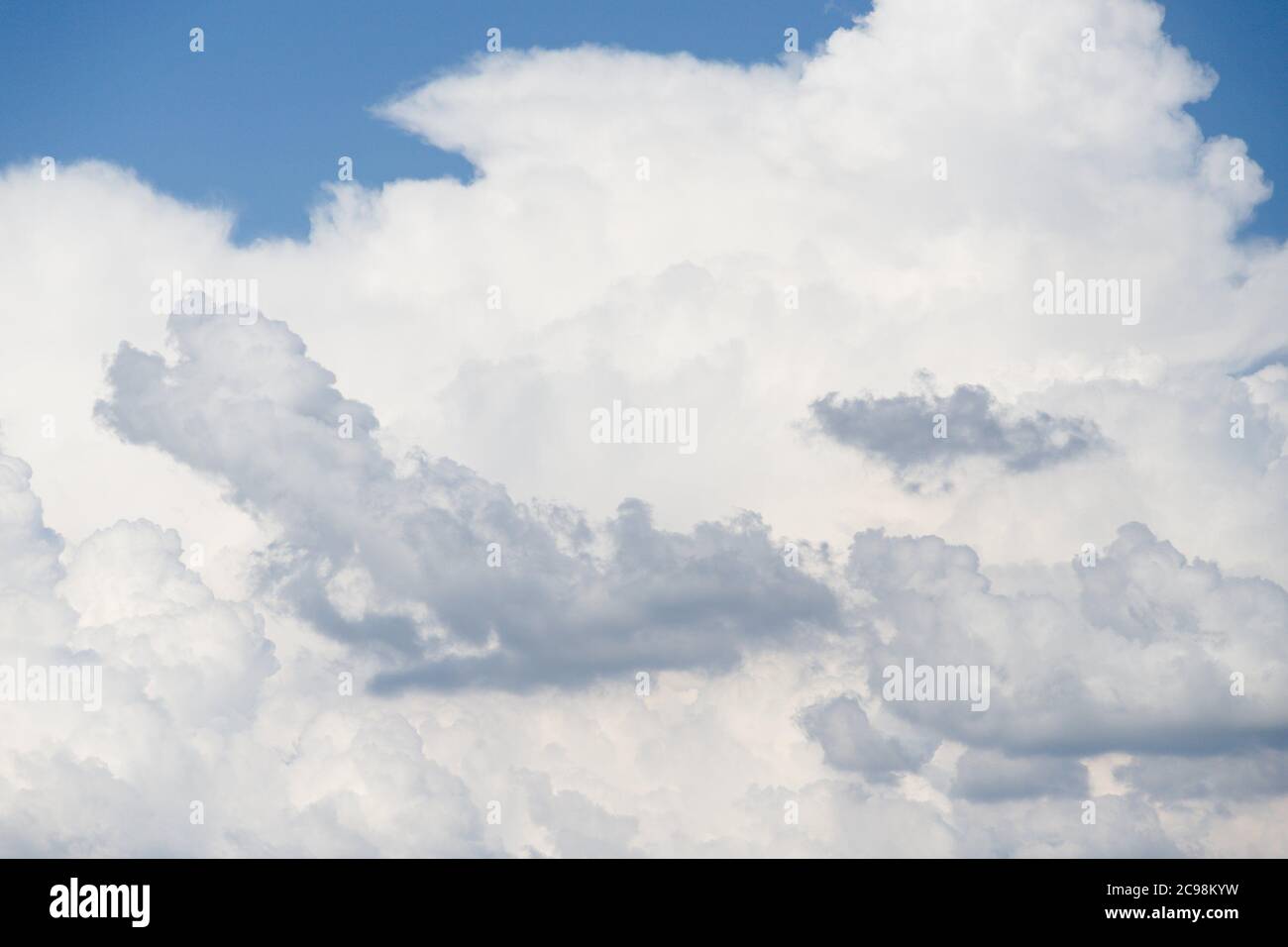 Blue sky with fluffy white and grey clouds, sky background Stock Photo ...