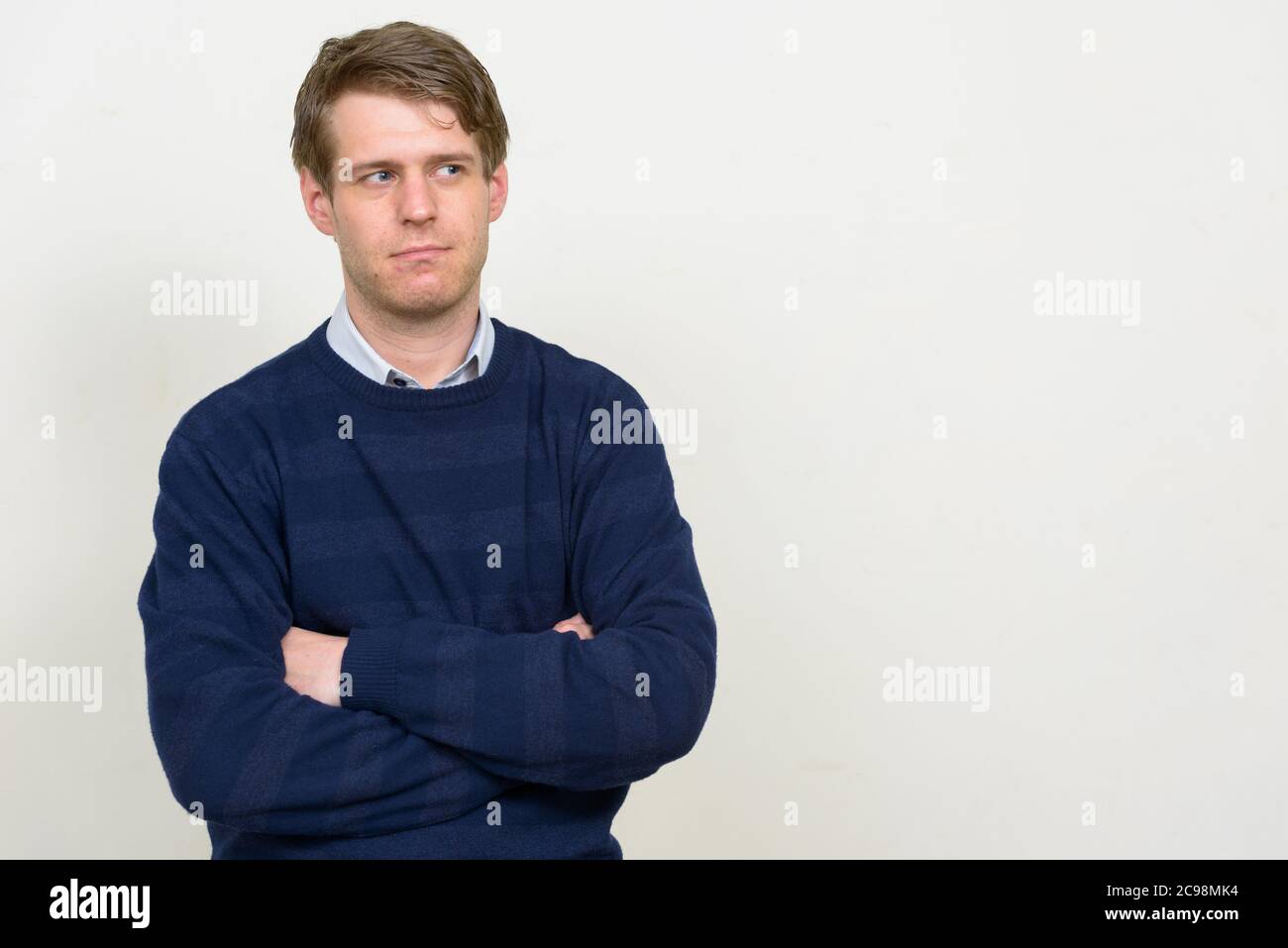 Portrait of young handsome man with blond hair Stock Photo - Alamy