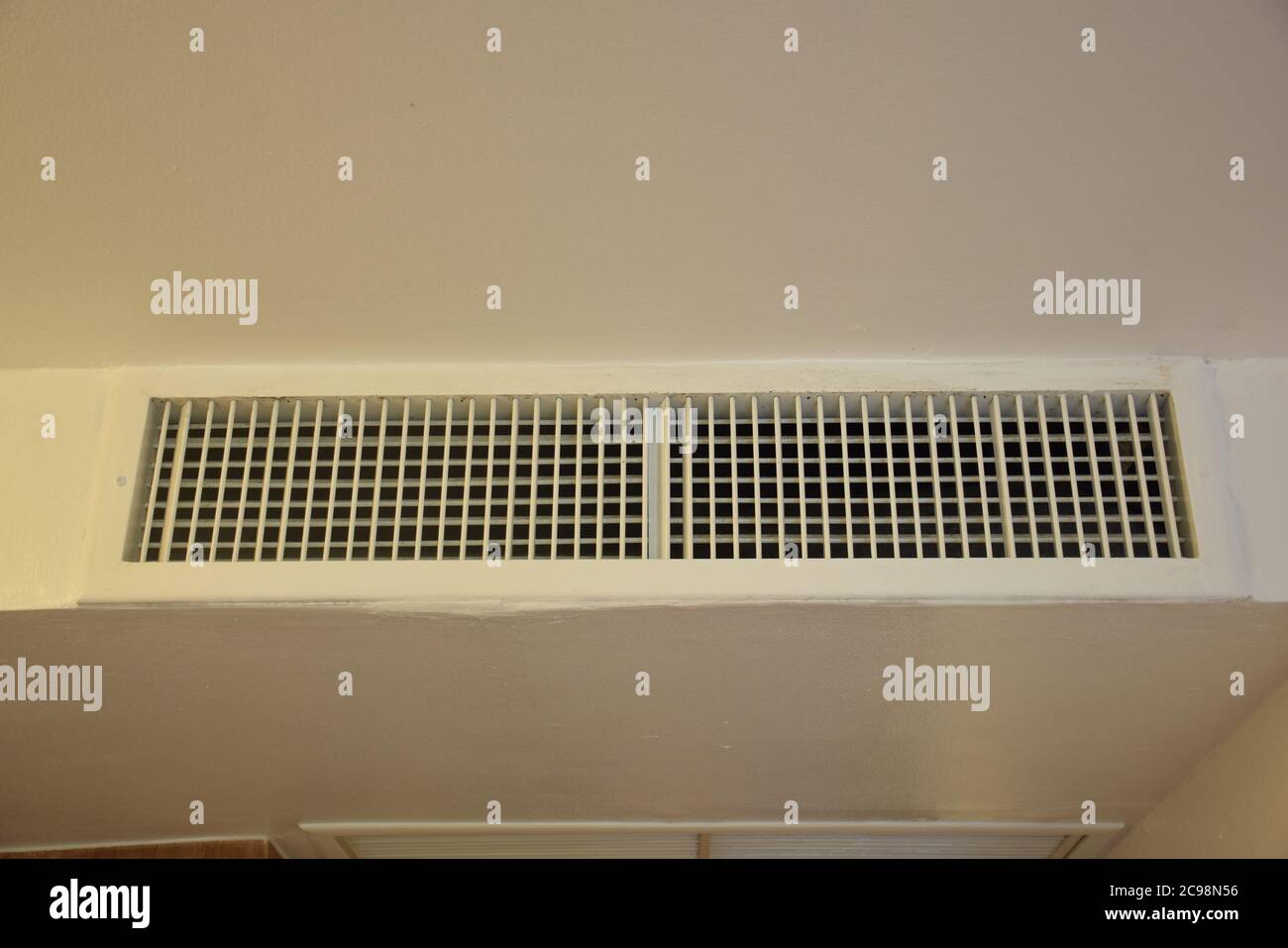 Double deflection grille - Supply Air Grille in Hotel room Stock Photo