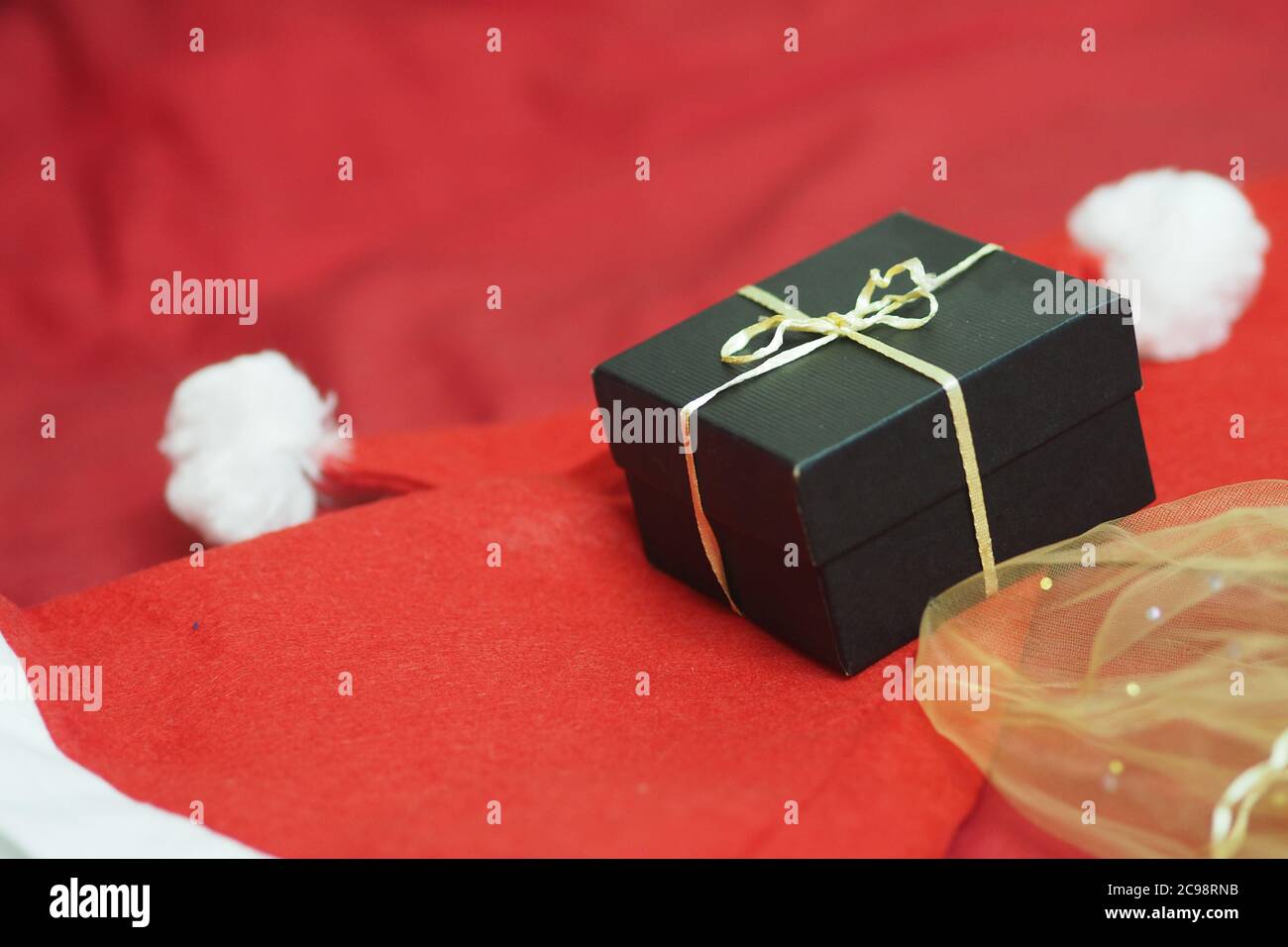 The Girl is opening gifts on Christmas day. Stock Photo