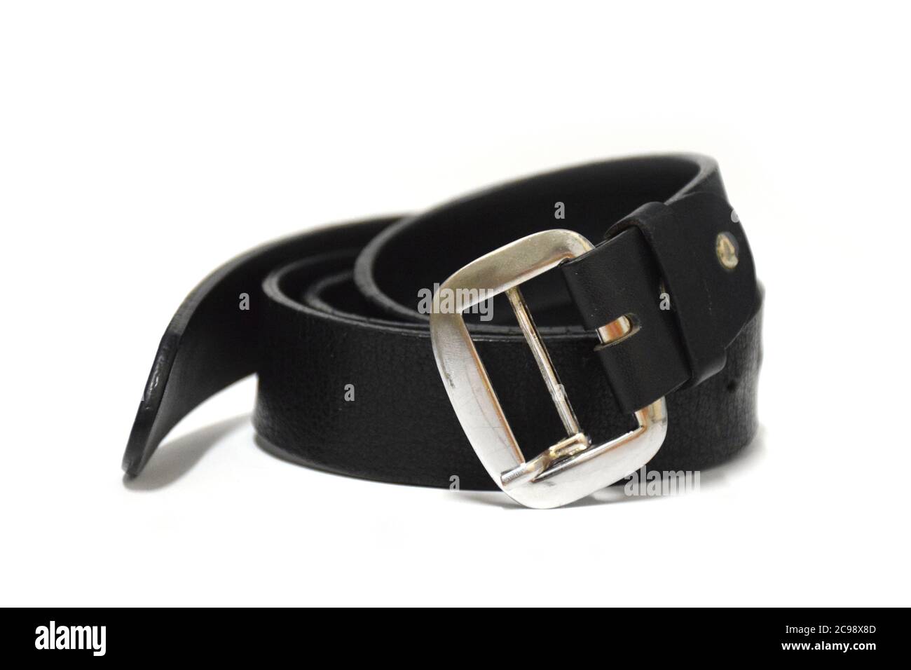 Black Leather Belt on white background. Stock Photo