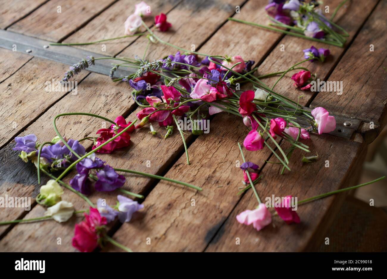 Flowers arranged on a table at Wedding lunch. Stock Photo