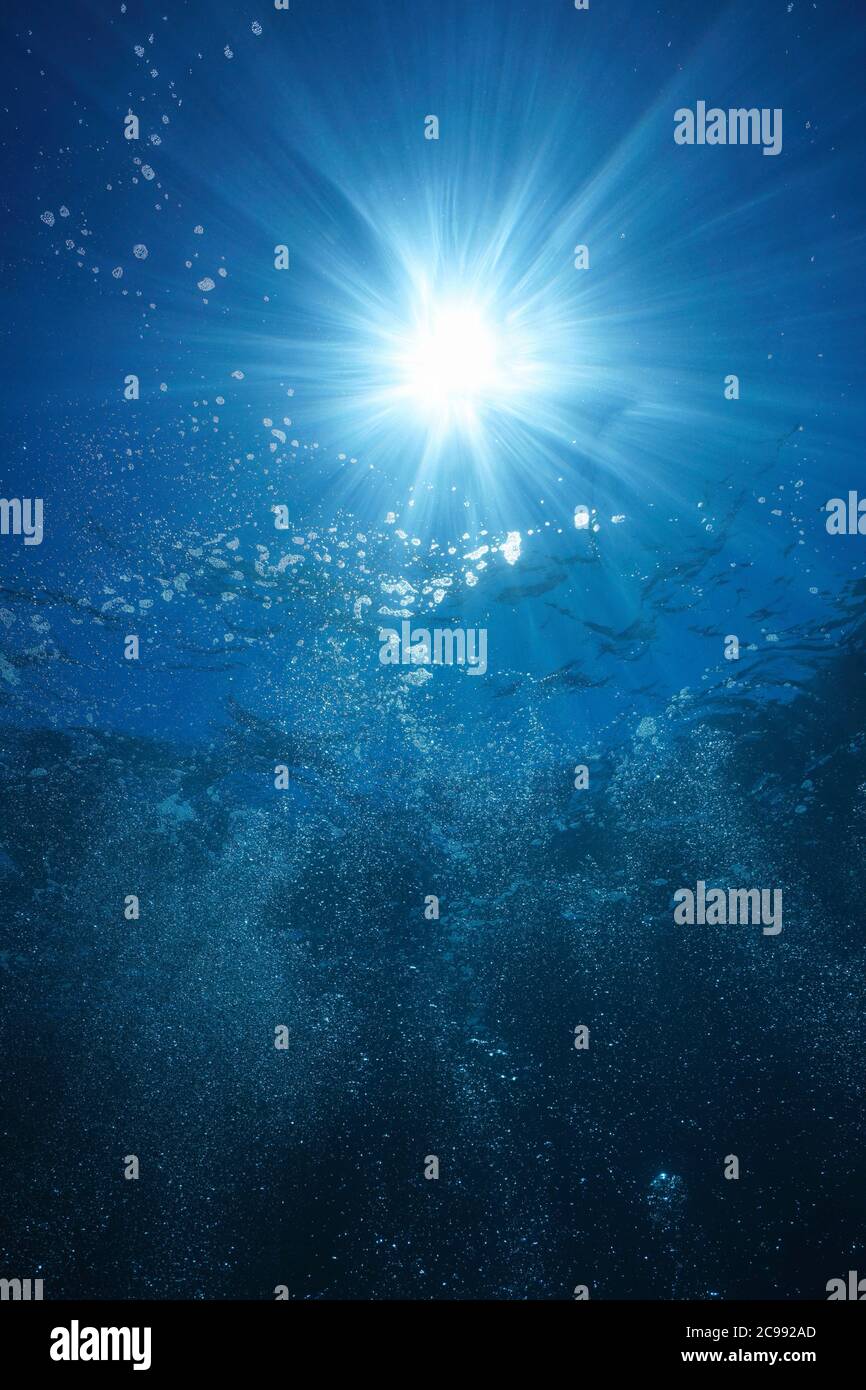 Underwater sunlight with air bubbles rising to water surface, natural scene, Mediterranean sea Stock Photo