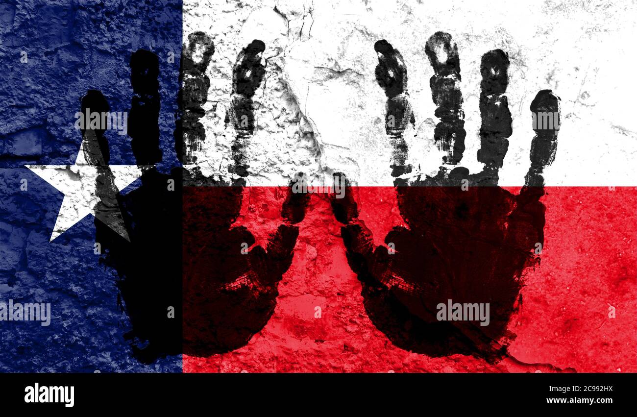 Handprints on the background of the flag of State of Texas. Freedom of