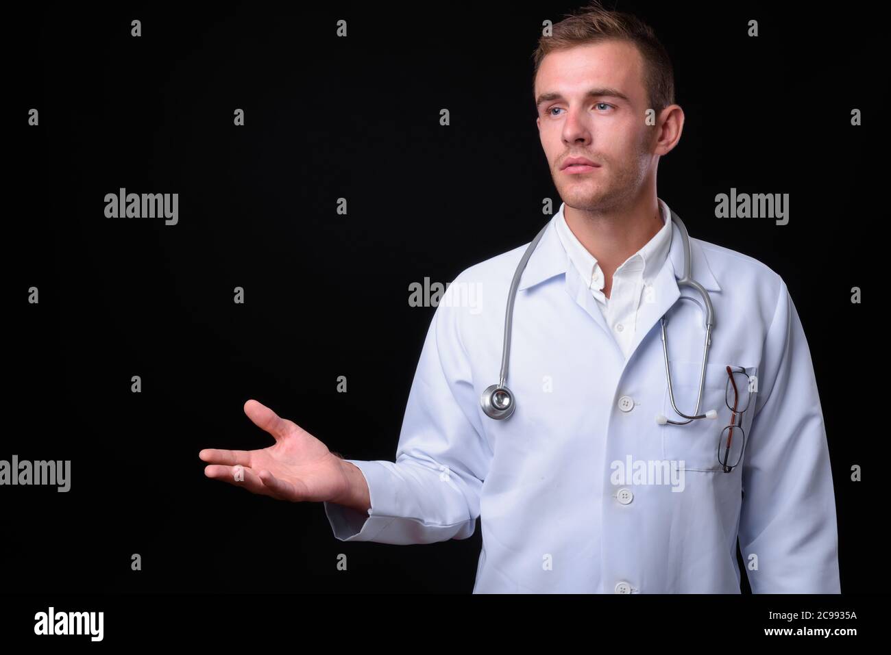Handsome doctor talking young hi-res stock photography and images - Alamy
