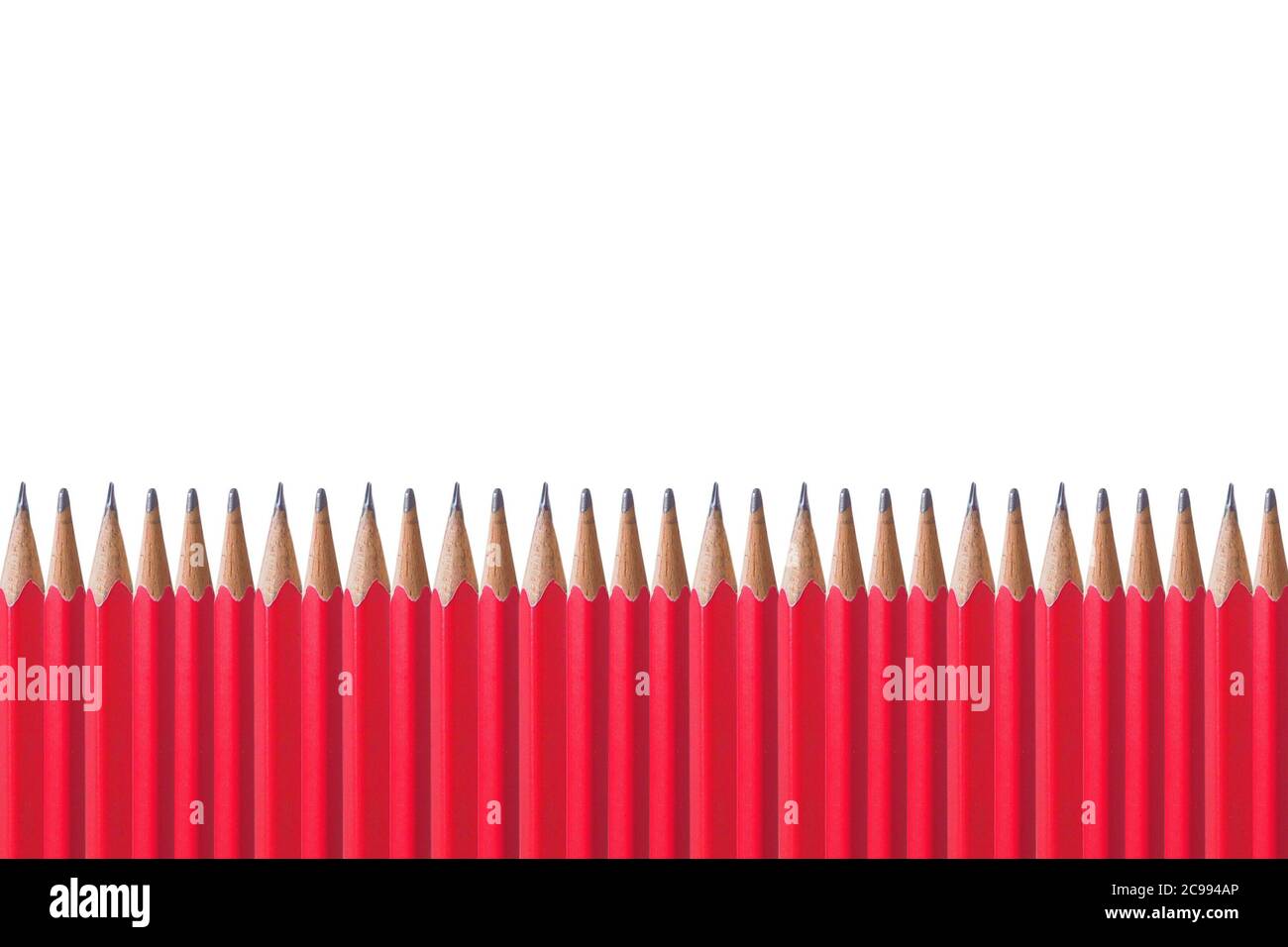 Red pencil placed isolated on a white background Stock Photo - Alamy