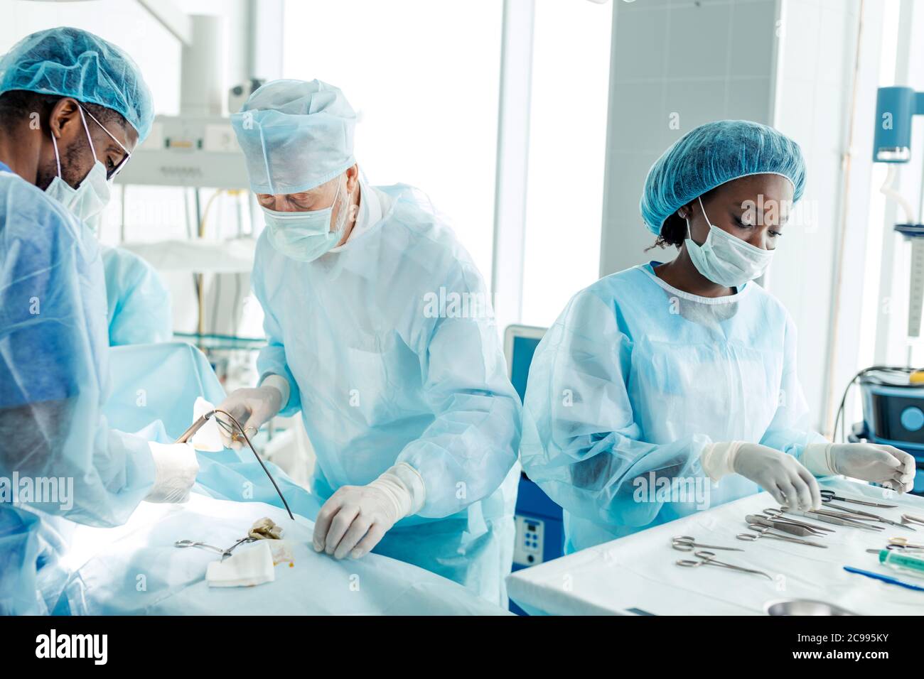 talented old doctor and his team taking part in the master class. close up photo Stock Photo