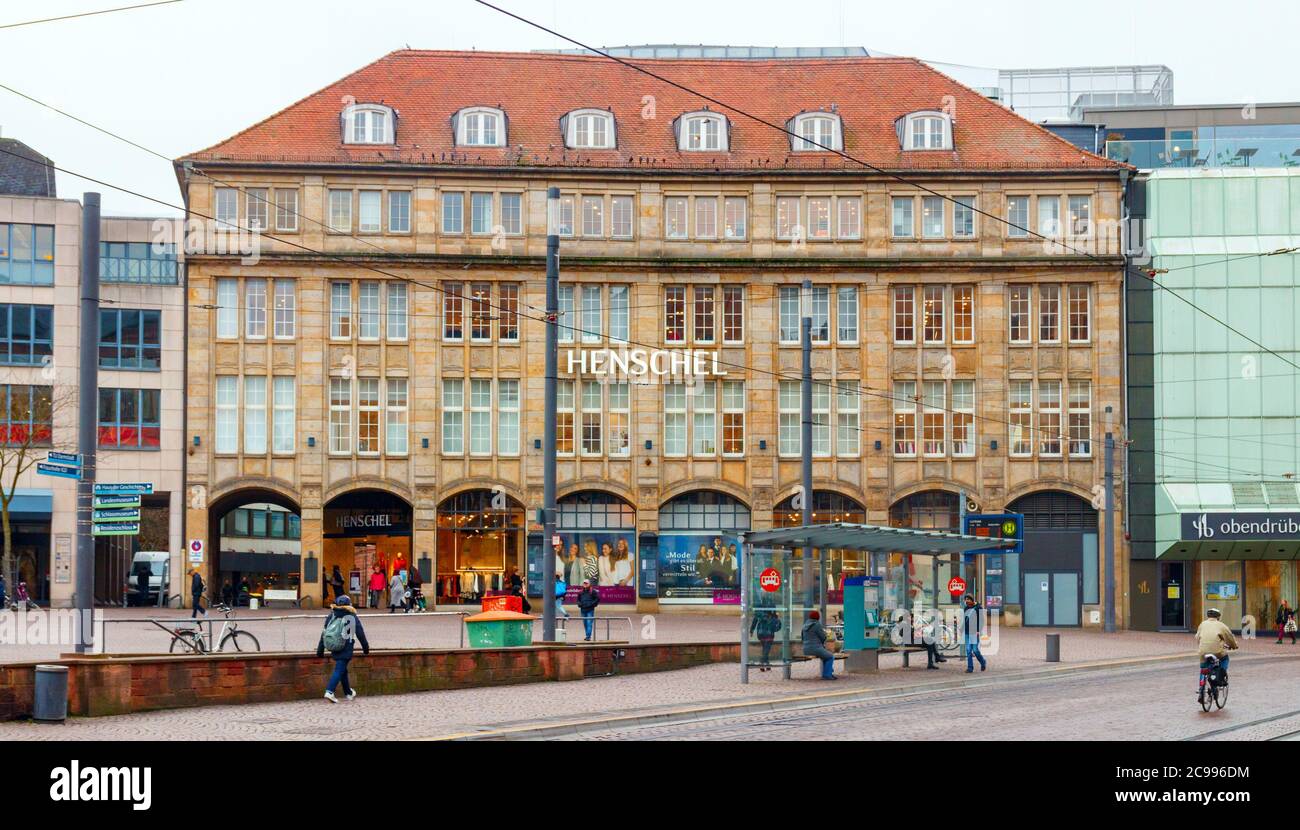 Darmstadt city centre. View of the Market Square (Marktplatz) and the Henschel GmbH department store headquarters under a cloudy sky. Germany. Stock Photo