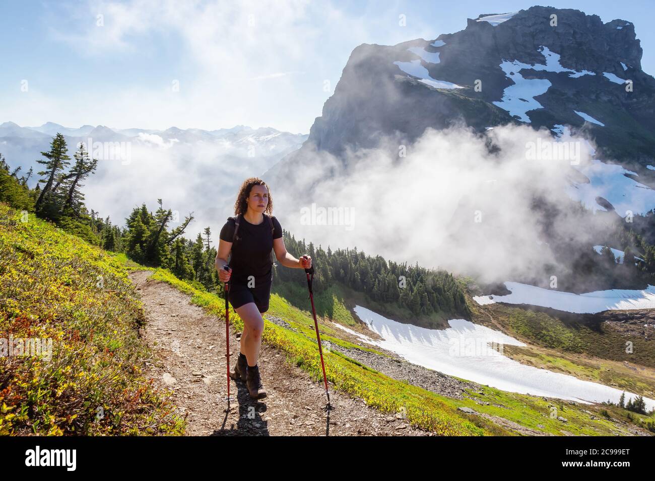 Girl hiking in Canadian Mountains Stock Photo Alamy