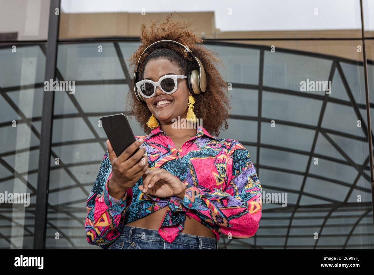 Happy black lady using hi-res stock photography and images - Alamy