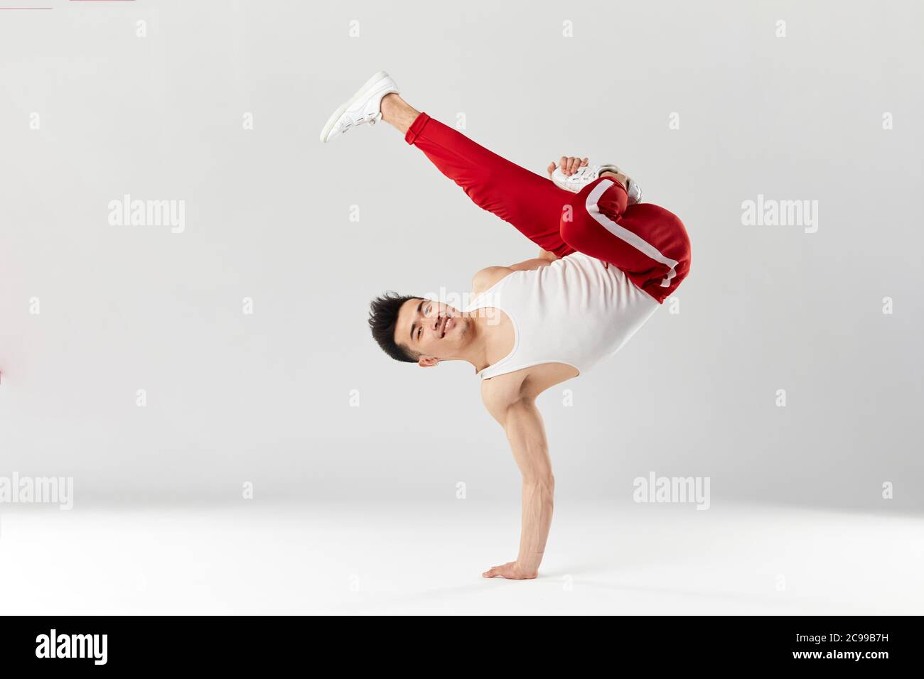 Athletic Young B Boy Standing On One Hand While Dancing Break Dance And Doing Downrock Isolated Over White Studio Background Stock Photo Alamy Athletic Young B Boy Standing On One Hand While Dancing Break Dance And Doing Downrock Isolated Over White Studio Background Stock Photo Alamy