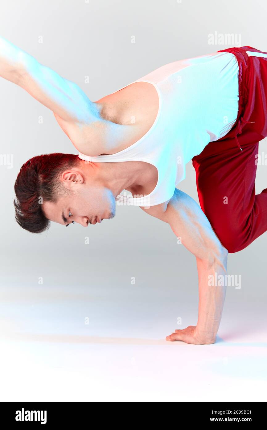Handstand of Korean breakdancer performing breakdance freeze upside