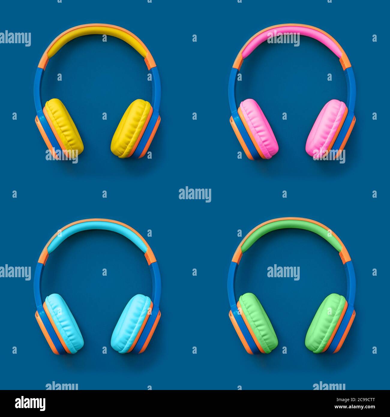 Set of four multi-colored headphones on blue background. Minimalistic fashion music concept. Trendy color of the year Top view, flat lay, copy space. Stock Photo