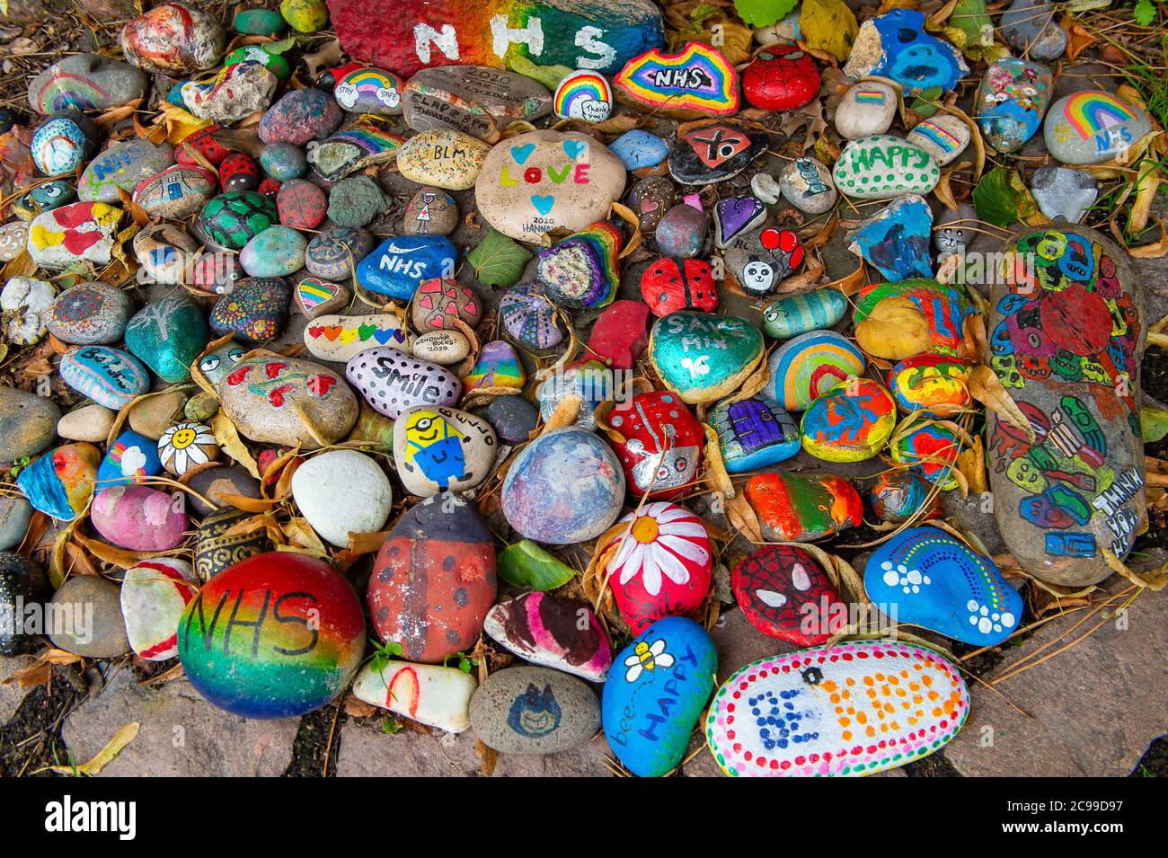 Wendover, Buckinghamshire, UK. 28th July, 2020. Wendover Rocks. Brightly painted stones remain in Wendover town centre following the Coronavirus lockdown giving messages of thanks and hope to the NHS and key workers. Credit: Maureen McLean/Alamy Stock Photo