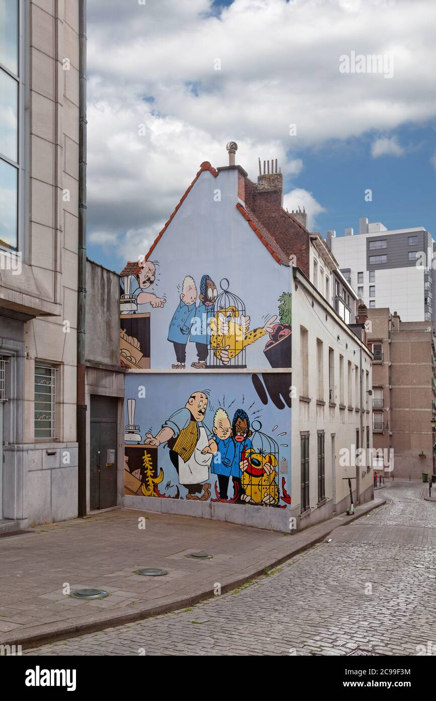 Brussels, Belgium - July 02 2019: The Blondin and Cirage Wall is located 'Rue des Capucins'. The wall illustrates the Blondin and Cirage in a grocery Stock Photo
