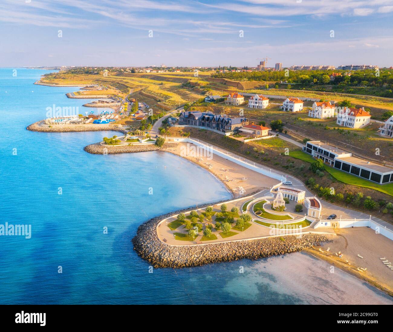 Aerial view of beautiful sandy beach, blue sea, promenade Stock Photo