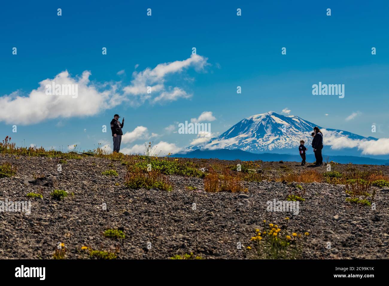 Family making memories with Mount Adams distant, Mount St. Helens National Volcanic Monument