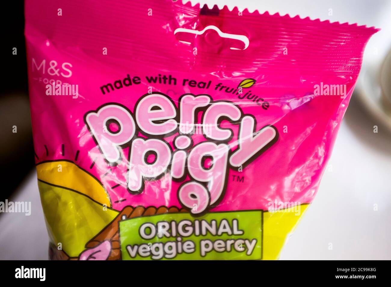 M&S Original Veggie Percy Pig sweets made with real fruit juice Stock Photo