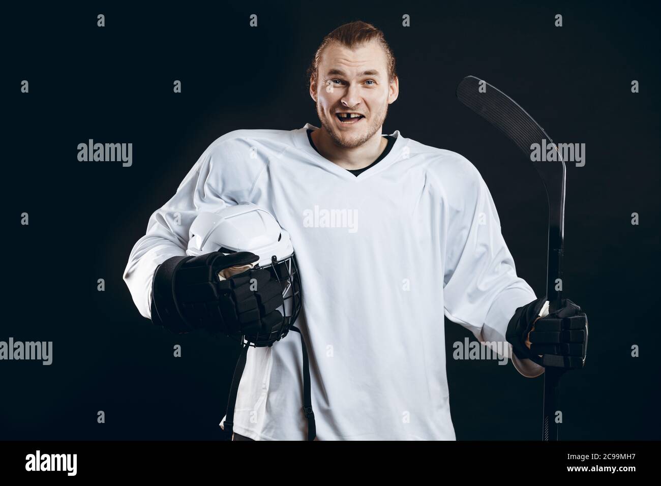 Hockey player with missing tooth hires stock photography and images