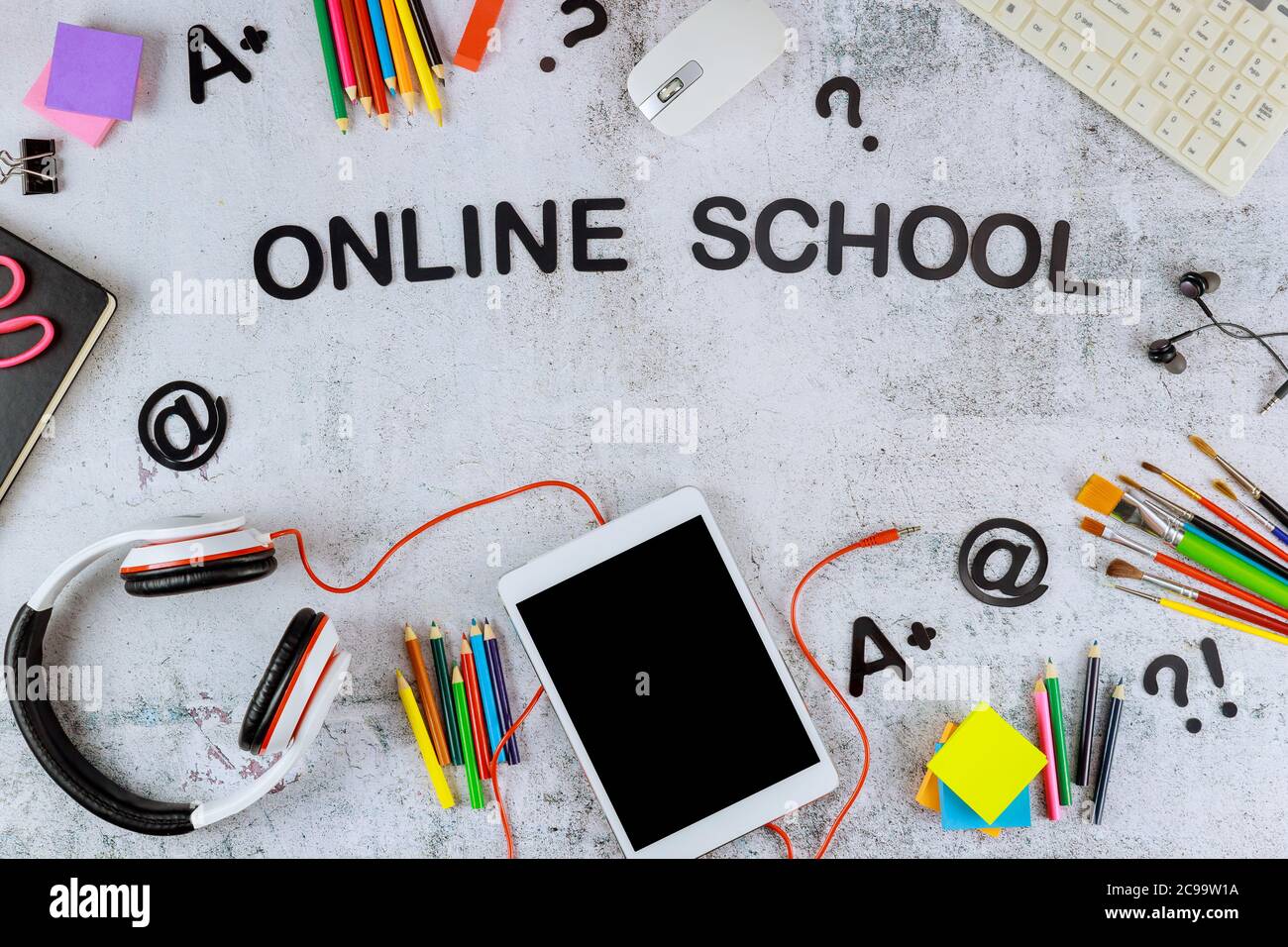 Digital tablet with black mockup screen for school education and art  supplies on white background Stock Photo - Alamy