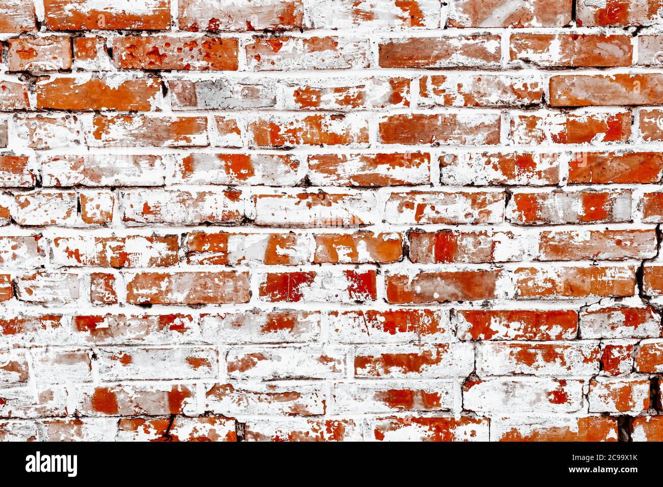 Rustic red brick background with white paint Stock Photo - Alamy