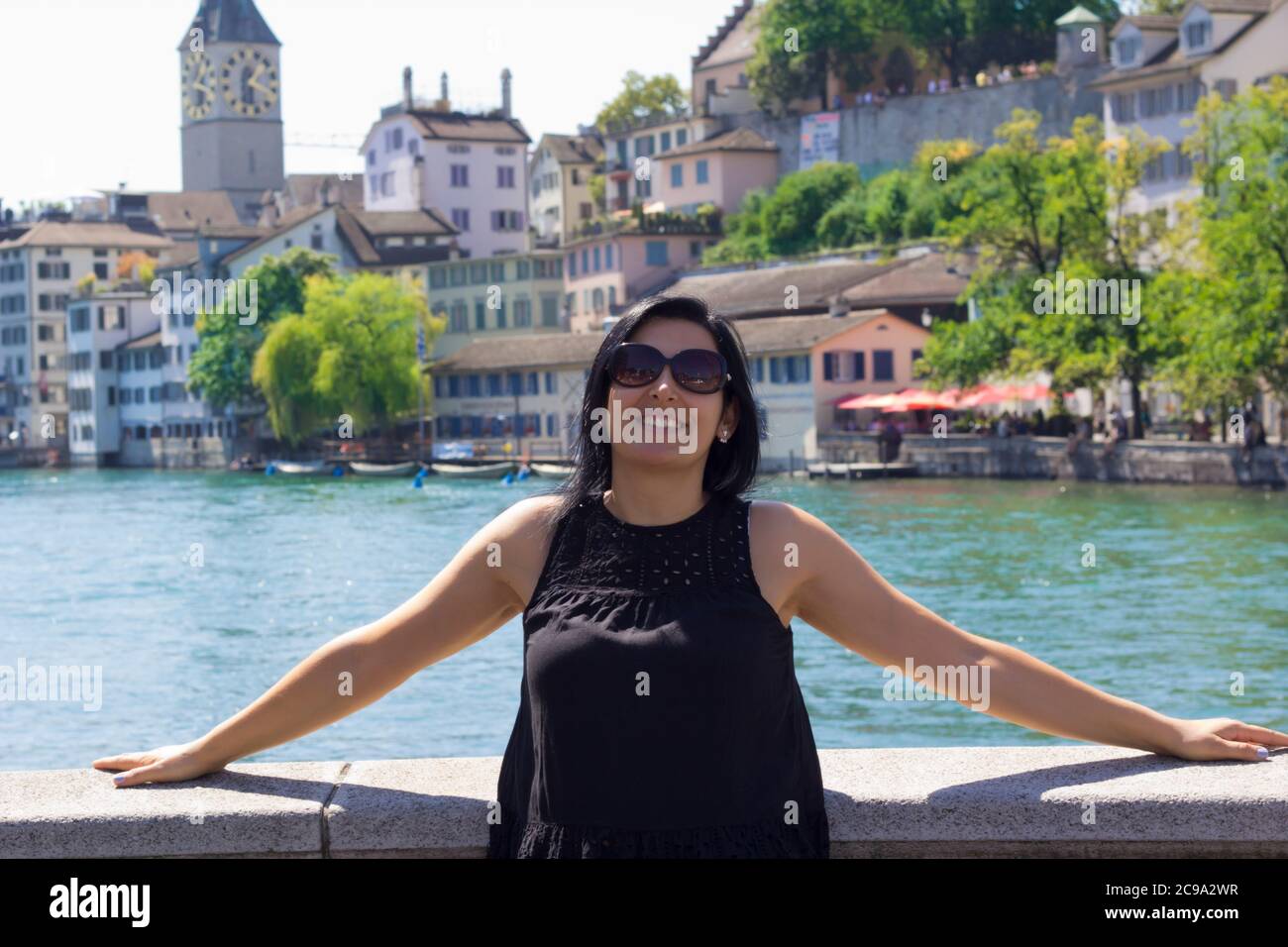 Happy woman in Zurich city, Switzerland Stock Photo