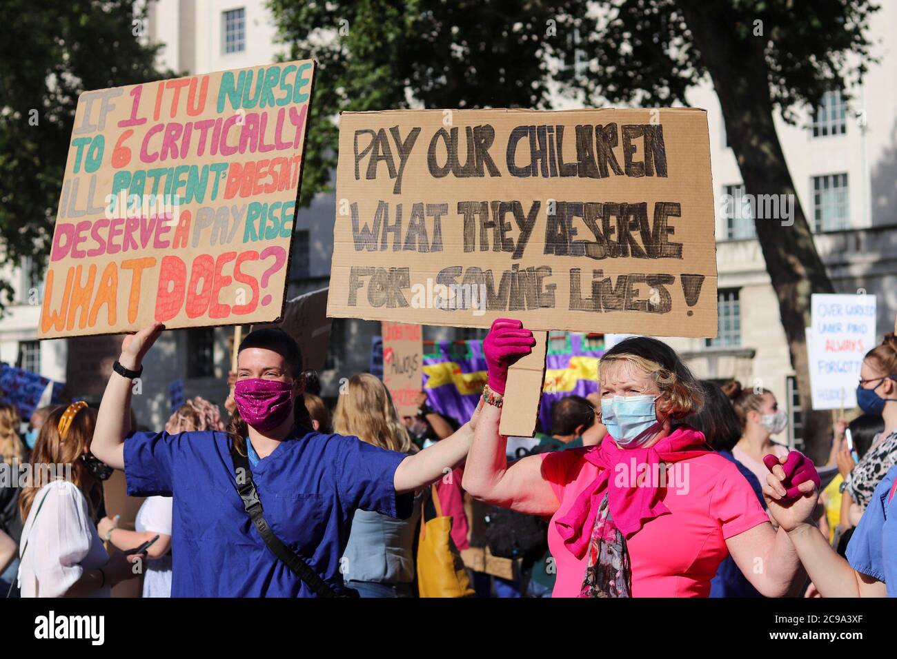 LONDON, ENGLAND, JULY 29 2020, NHS staff protest outside Downing Street after marching from St Thomas's Hospital at the 'March For Pay Justice for NHS and Key Workers' (Credit: Lucy North | MI News) Credit: MI News & Sport /Alamy Live News Stock Photo