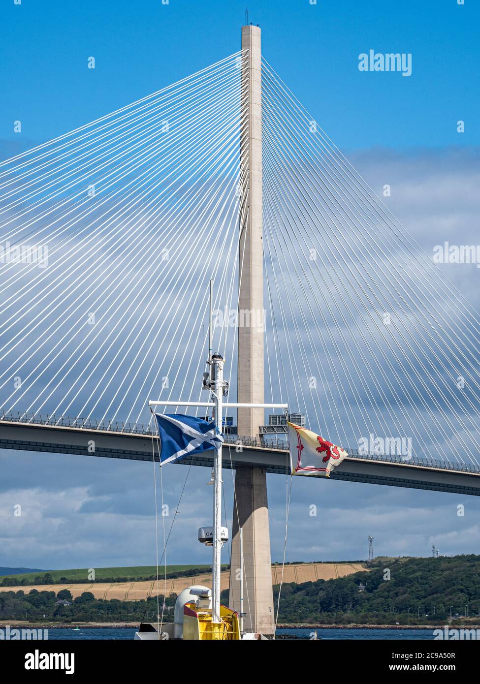 The new Forth Bridge is an impressive sight as they across the Firth of Forth, as well as providing road and rail transport links between Edinburgh an Stock Photo