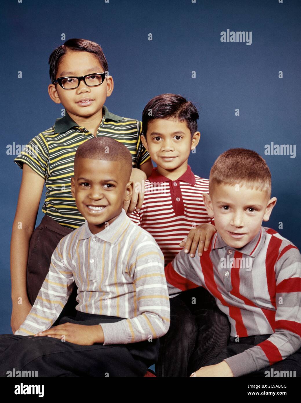 1960s PORTRAIT 4 BOYS IN STRIPED TEE SHIRTS ETHNIC RACIAL DIVERSITY ASIAN HISPANIC AFRICAN-AMERICAN CAUCASIAN LOOKING AT CAMERA - kj3810 HAR001 HARS COPY SPACE FRIENDSHIP HALF-LENGTH INSPIRATION RACIAL MALES EYE CONTACT HAPPINESS CHEERFUL ORIENTAL AFRICAN-AMERICANS AFRICAN-AMERICAN SHIRTS BLACK ETHNICITY PRIDE ASIAN AMERICAN SMILES FRIENDLY JOYFUL VARIOUS VARIED ASIAN-AMERICAN COOPERATION JUVENILES TOGETHERNESS CAUCASIAN ETHNICITY HAR001 HISPANIC ETHNICITY OLD FASHIONED AFRICAN AMERICANS Stock Photo