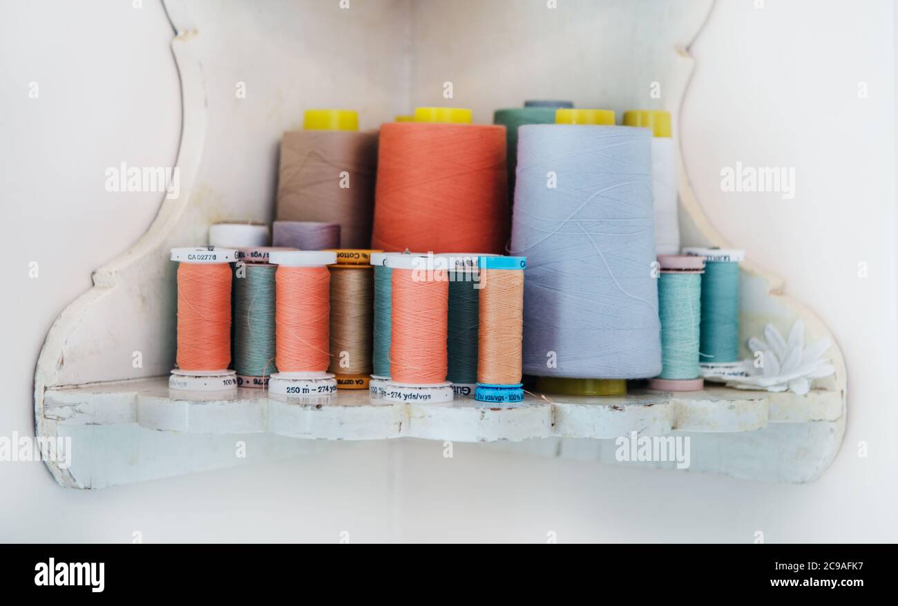 Detail of colorful spools of thread for sewing Stock Photo