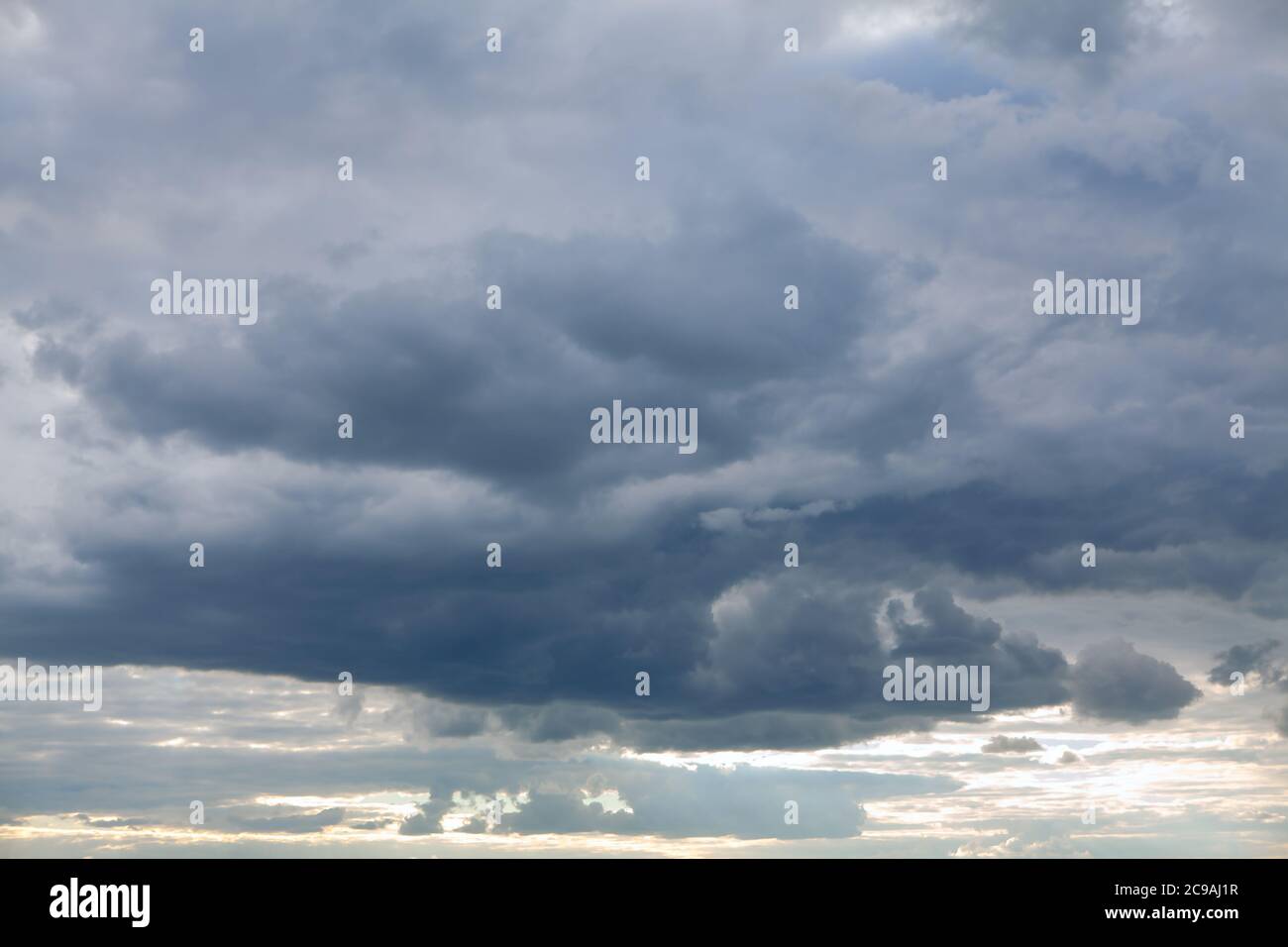Nimbostratus clouds with sunlight in the evening Stock Photo Alamy