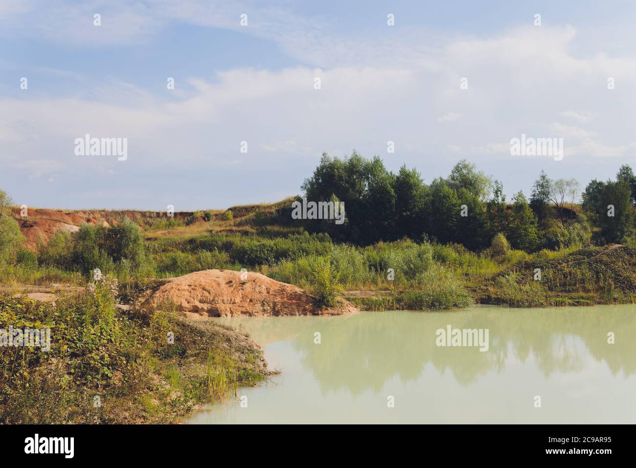Open pit asbestos quarry lake with blue water Stock Photo Alamy