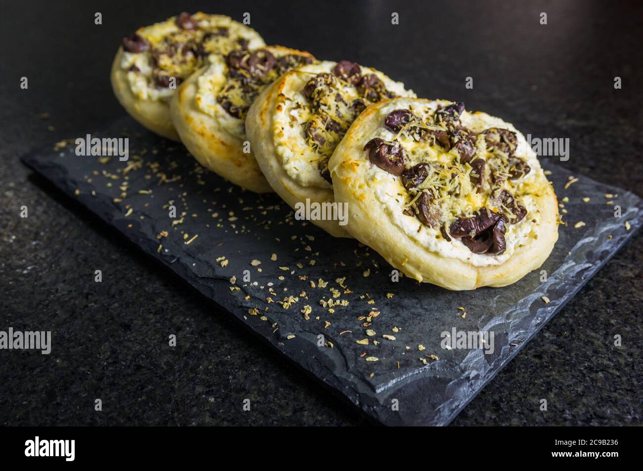 Delicious Lebanese (Arabic) food, Mediterranean ricotta sfiha, olives