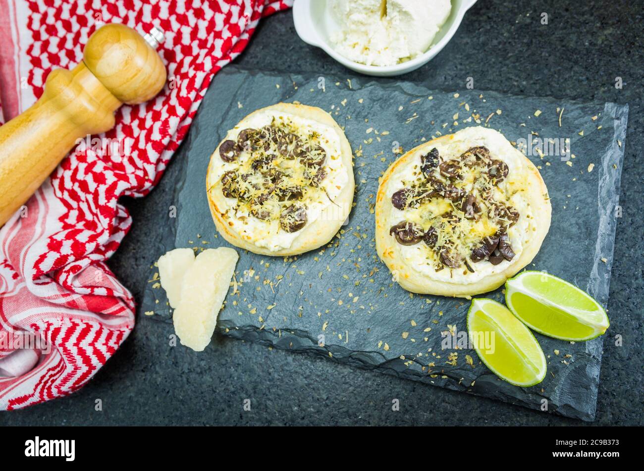 Delicious Lebanese (Arabic) food, Mediterranean ricotta sfiha, olives