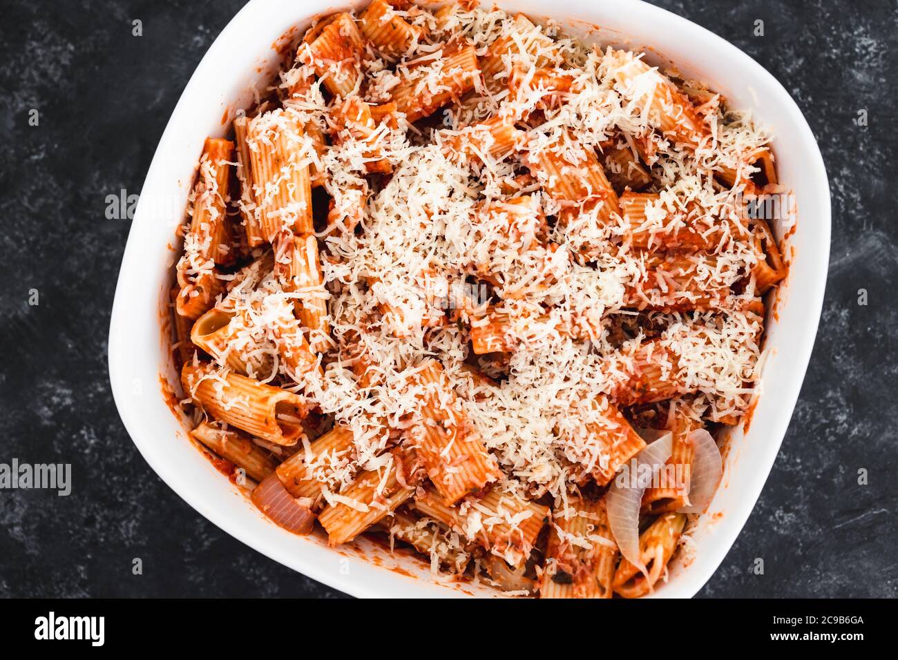 Healthy Plant Based Food Recipes Concept Vegan Rigatoni Pasta Bake With Red Pesto Sauce And Dairy Free Cheese Before Going In The Oven Stock Photo Alamy